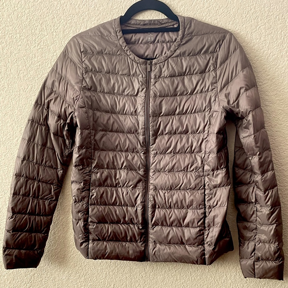Uniqlo ultra light down jacket in medium, light brown / taupe.